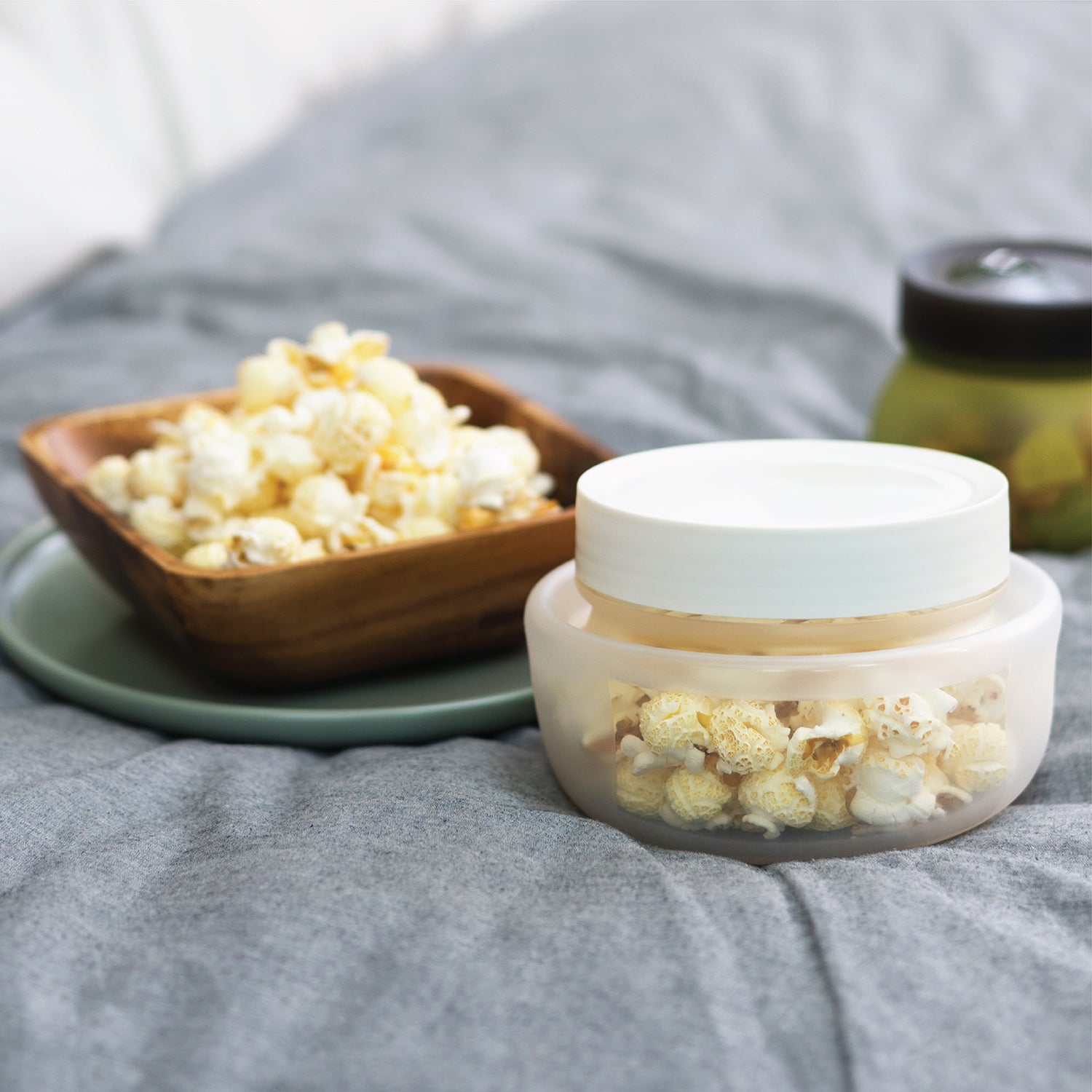 Collapsible silicone jar filled with popcorn